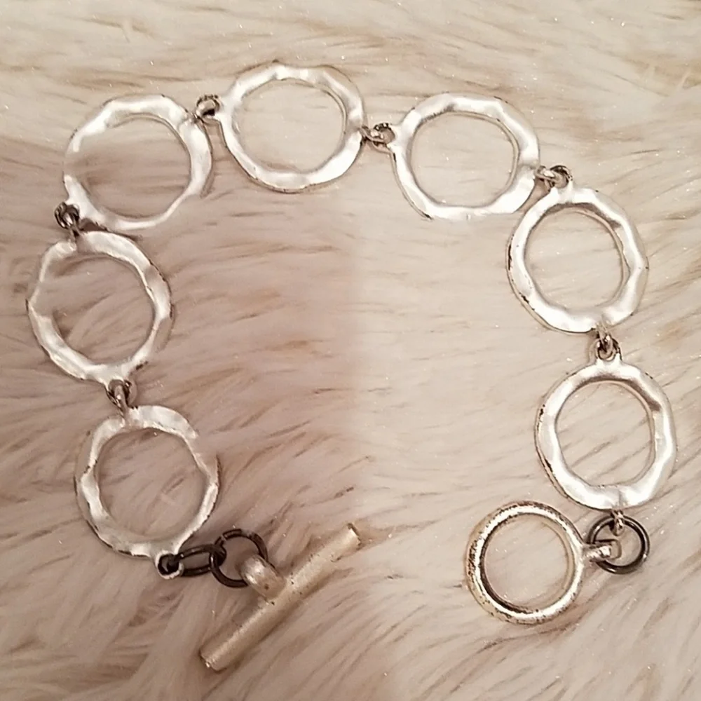 Kenneth Cole silvertone circle toggle bracelet